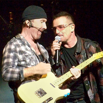 Bono and The Edge of U2 at Gillette Stadium, Foxboro, MA 9/21/2009. Photo via Wikipedia Commons by xrayspx